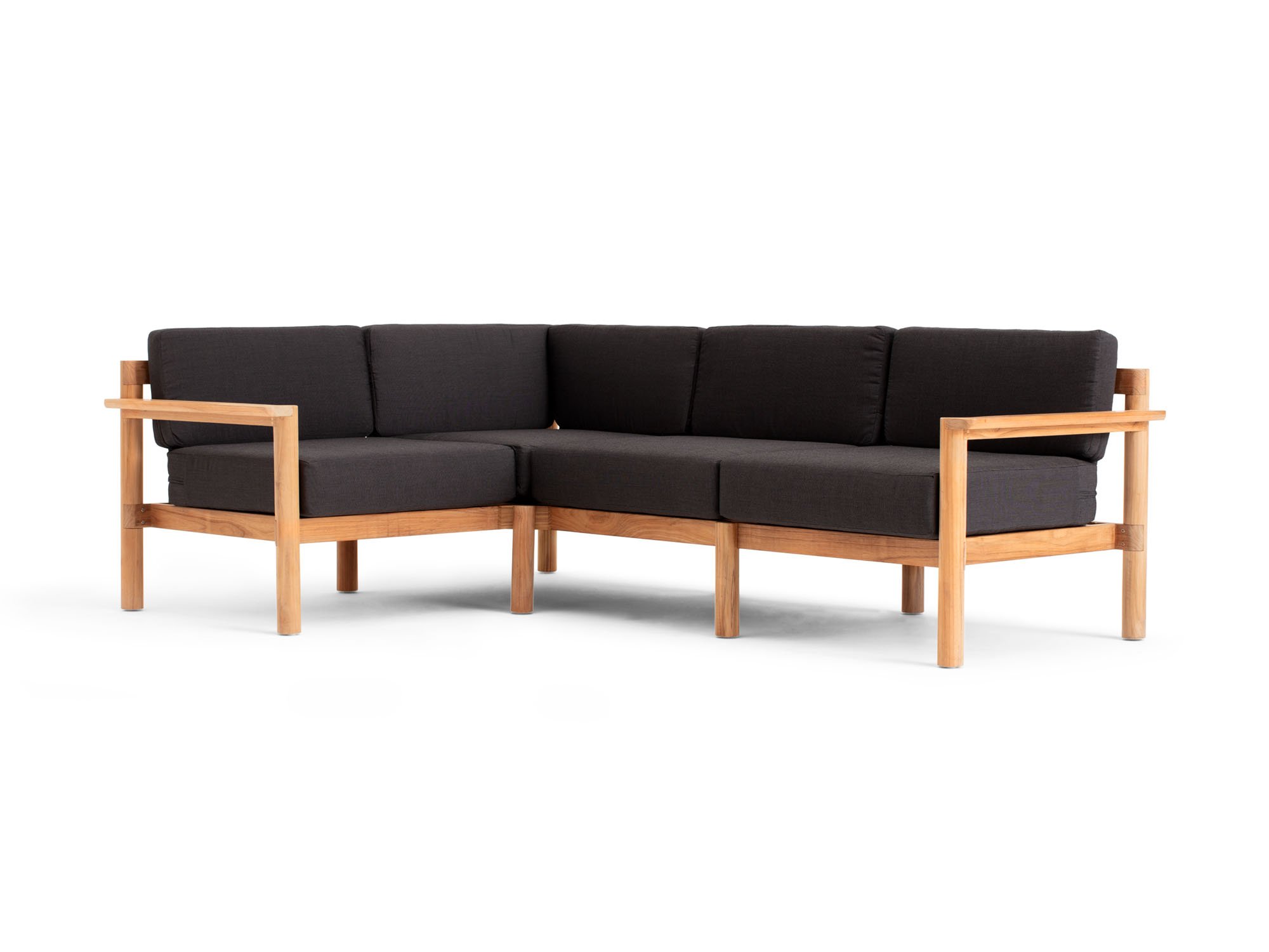 Front angle view of 4-piece outdoor sectional with black cushions